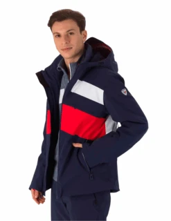 Veste Thermique Rossignol React Homme -Équipement De Plein Air Veste Ski Rossignol React Homme Bleu Rouge vue ecusson 1
